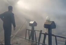 Iranian Army Helicopter Crashes in Isfahan Market, Four Dead Smoke rising from crashed Iranian military helicopter at market in Isfahan province