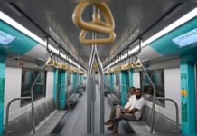 What Mumbai’s Aqua Line Revealed During a Quiet 5 A.M. Journey lt text : Inside view of Mumbai Metro Aqua Line coach during an early morning journey to Churchgate