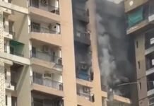 Noida High-Rise Fire: Massive Blaze Erupts at Sector 119 Residential Tower, Two Flats Damaged Fire engulfs two flats in a high-rise residential tower at Aranya Society in Noida's Sector 119 after a suspected AC blast.
