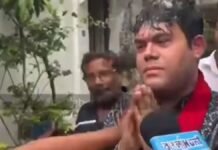 TMC Leader Nilanjan Das Assaulted, Grabbed by Collar During Media Interaction; Viral Video Sparks Political Row TMC leader Nilanjan Das surrounded by a crowd during a viral incident in West Bengal.