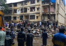 Mumbai Building Collapse Claims Six Lives Amid Torrential Rain; Rescue Operations Continue Emergency teams carrying out rescue operations after a building collapse in Mankhurd, Mumbai