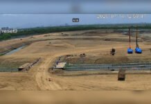 Kasheli Metro Depot Progress Marks Key Milestone in Strengthening Metro Line 5 Operations Aerial view of the under-construction Kasheli Metro Depot for Mumbai Metro Line 5, showing earthworks, railway connectivity, depot infrastructure and ongoing construction activities.