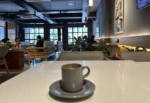 Espresso by Espresso: Koraput Beckons A freshly brewed espresso sits on a café table inside Kruti Coffee, inviting visitors to discover Koraput coffee culture one cup at a time.