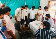 Sindhudurg Mega Health Camp Draws Strong Response, Focuses on Rural Access to Specialist Care Doctors examining a patient during the Mega Health Camp at Sindhudurg Medical College.