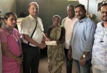 Sindhudurg ZP CEO Ravindra Khebudkar Extends Financial Support to Needy Family Sindhudurg Zilla Parishad CEO Ravindra Khebudkar handing financial assistance to Janabai Patil at her home in Insuli-Pagawadi.
