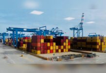 Vizhinjam Races Past Initial Capacity as ₹7,398-Crore Expansion Targets 5.7 Million TEUs Container yard and automated cranes at Vizhinjam International Seaport in Kerala