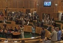 J&K Assembly Erupts in Chaos as BJP Protests Power Tariff Hike, NHM Demands and Jobs; Ruling Alliance Raises Statehood Issue BJP MLAs protest over power tariffs and public issues in Jammu Kashmir Assembly